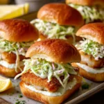Sheet Pan Crispy Flounder Sliders with Old Bay Apple Slaw and Lemon Tartar Crema
