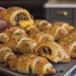 Golden Crescent Rolls Filled with Savory Seasoned Beef and Cheesy Goodness